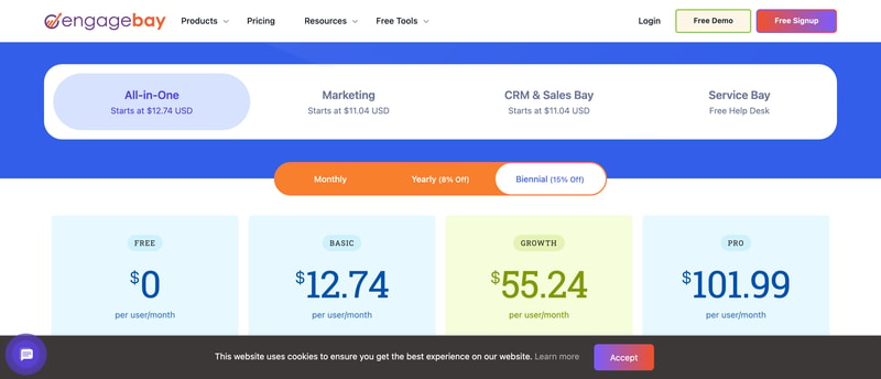 EngageBay’s pricing page with the Biennial (15% Off) toggle selected by default, showing All-in-One at Free, Basic $12.74, Growth $55.24, and Pro $101.99 per user per month, alongside separate Marketing, CRM & Sales, and Service Bay bundles.